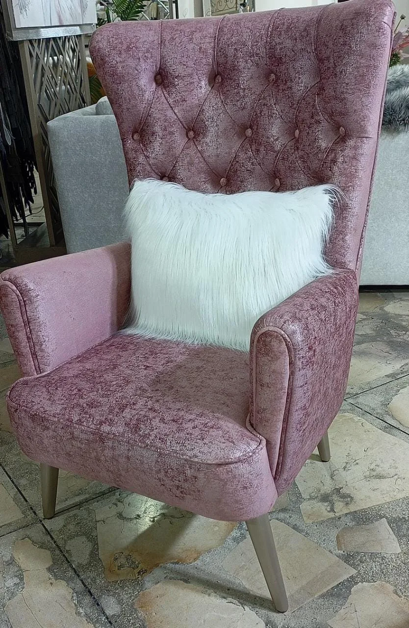 Sillón orejero capitoné