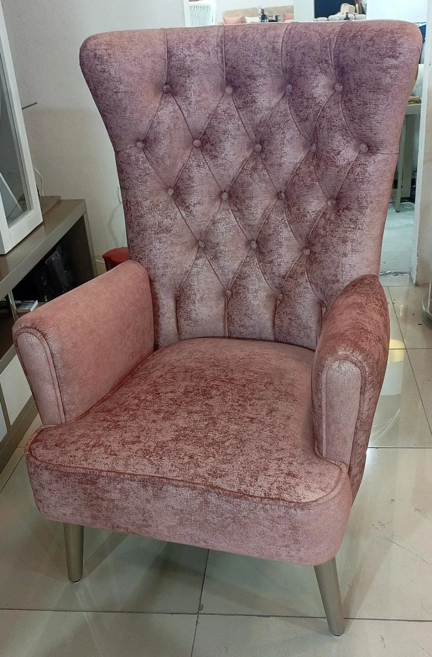 Sillón orejero capitoné